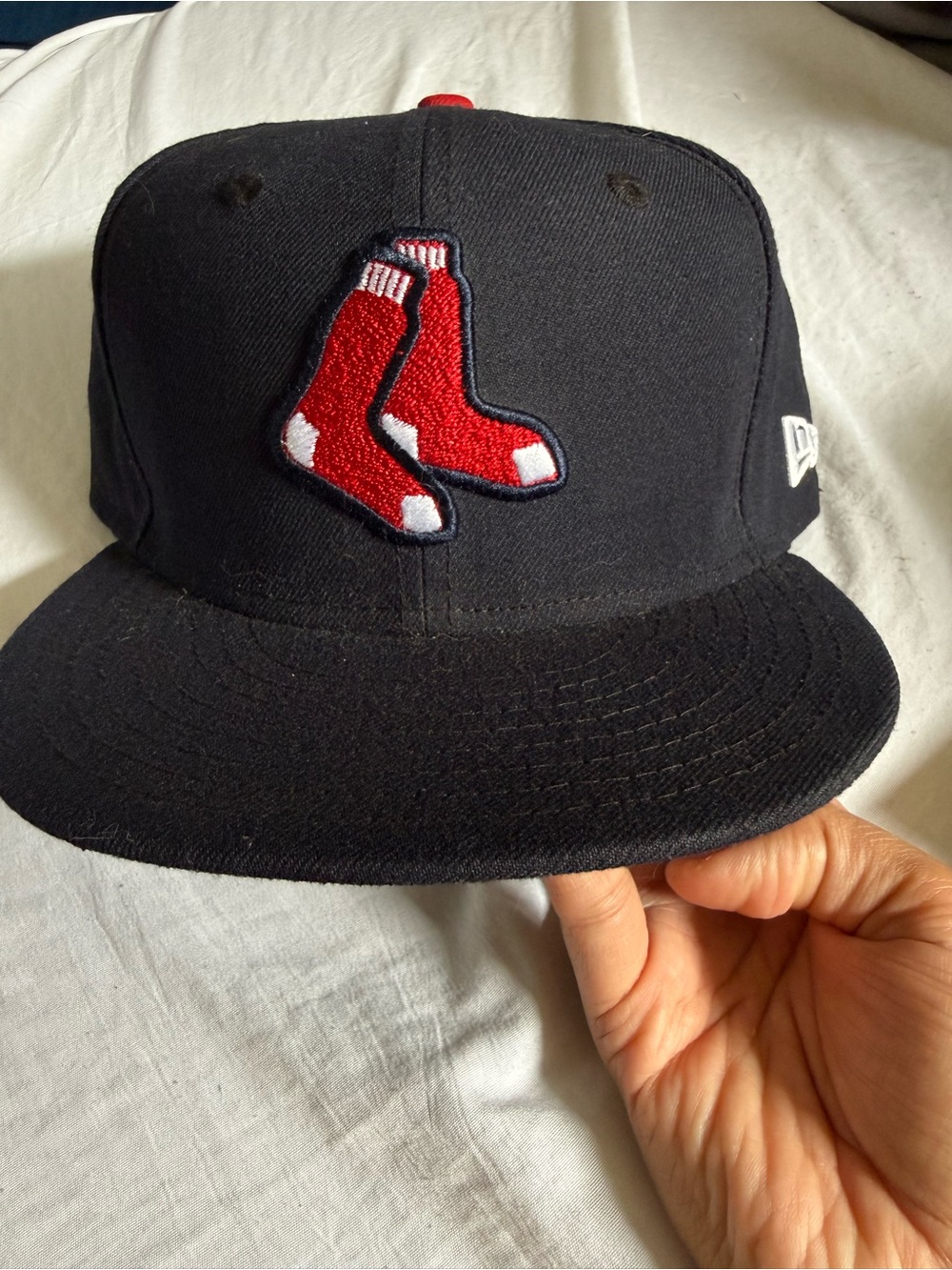 New Era Dark Blue Fitted Hat with Red & White Socks Logo